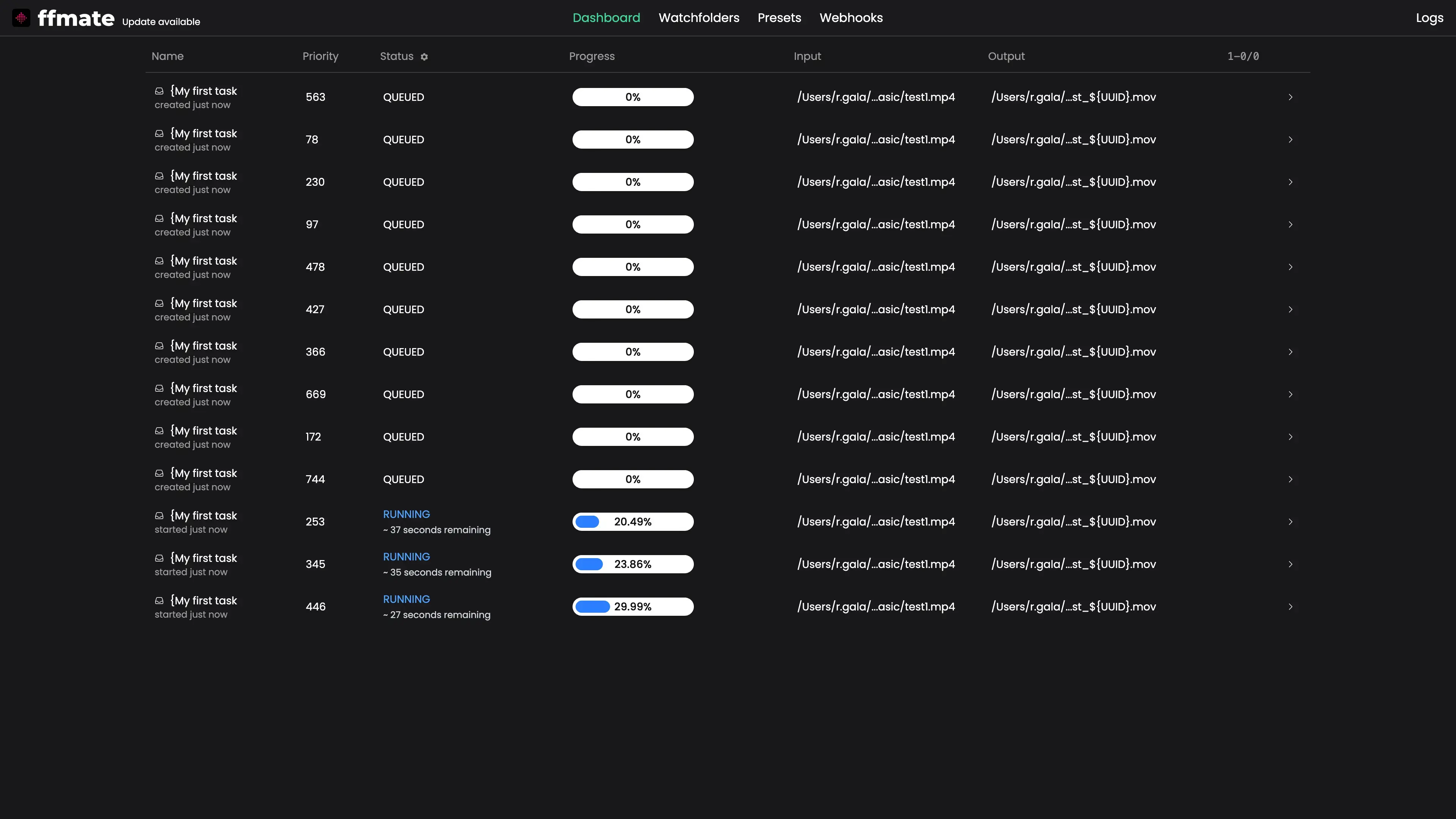 FFmate task dashboard displaying a list of media processing tasks with columns for name, priority, status, progress, input file path, and output file path. Several tasks are queued at 0%, while others are running with real-time progress bars and estimated time remaining